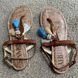 Very cute sandal with beads and fringe worn once!